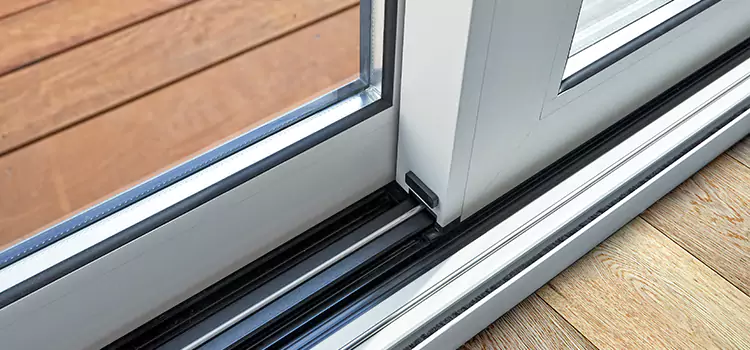 Why Your Sliding Door Keeps Getting Stuck in Okemos, MI?